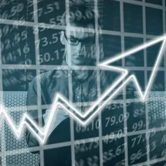 Analisi del prezzo metro quadro Torino zone: grafico in crescita con uomo d'affari e dati finanziari.
